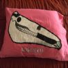 My new favorite thing, a bright pink pillow case with an animal skull on it.  I think it's a deer.  It says Kayo Dot which is a band that Adam listens to, which is how he got the pillowcase, but that part doesn't even matter.  It's awesomeness is all that matters.  Who knew that a pink skull pillowcase could brighten a girl's night everytime she hits the sack?  Not I. Not I.
